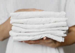 Washed & folded white clothing