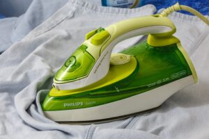 Green iron, don't leave unattended when ironing your clothes