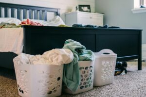 Full laundry baskets ready for cleaning at Liquid Laundromats