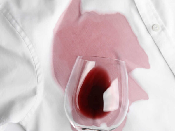 Red wine stain on white shirt