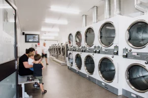 Laundromat savings – Row of laundromat machines