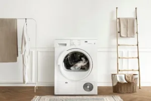 White washing machine cleaning laundry clothes